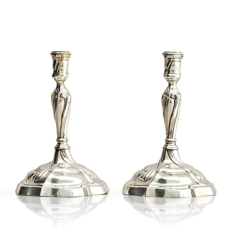A pair of German silver Rococo candlesticks, marks of Johann Jacob Baur, Augsburg 1777-1779.