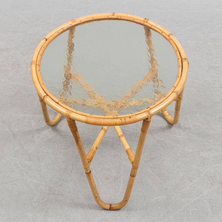 A second half of the 20th century sofa, table and armchairs.