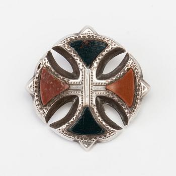 A BROOCH set with jasper and heliotrope.