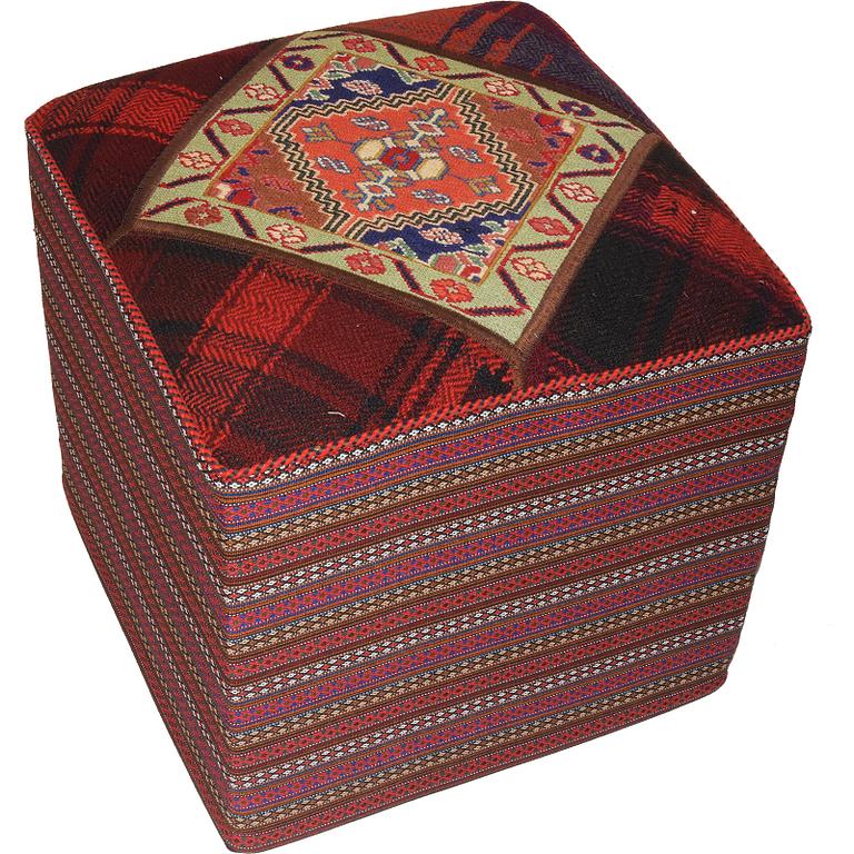 A kilim footstool,