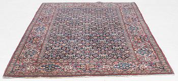 A rug, probably Meshed, semi-antique, c. 180 x 125 cm.
