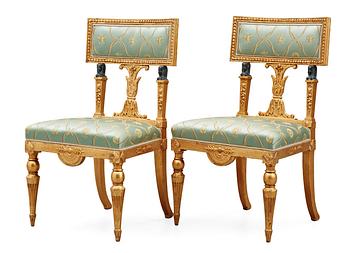 A late Gustavian early 19th Century seating, comprising seven parts (one sofa, four armchairs, two chairs).