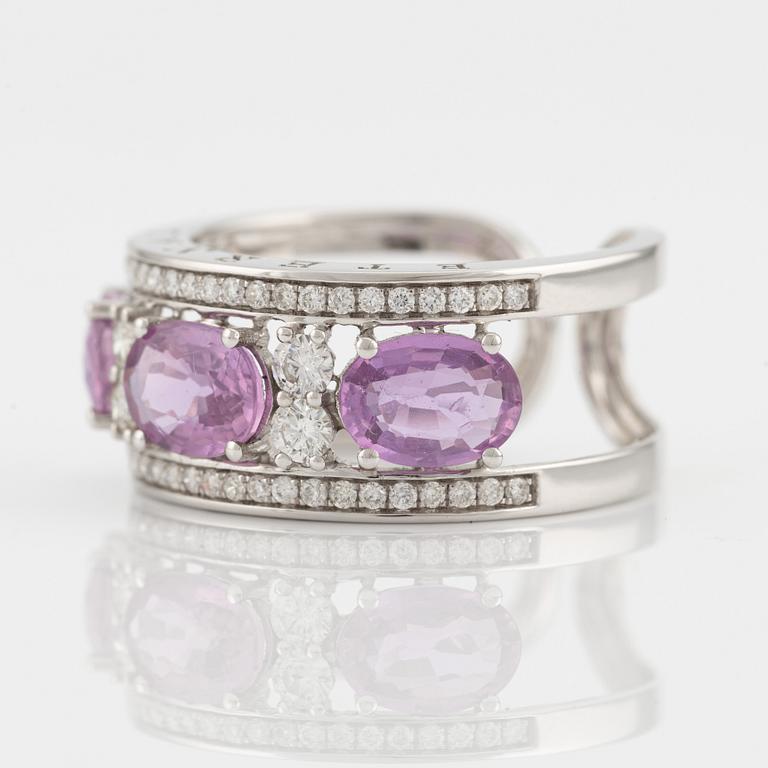 Ring with three pink sapphires and brilliant-cut diamonds.