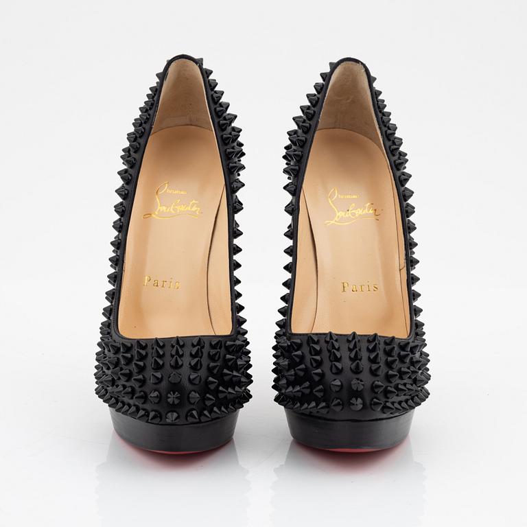 Christian Louboutin, a pair of black leather and studs pumps, size 36 1/2.