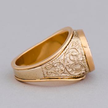 A RING, 14K gold 'Harley Davidson'. Juha Tarnanen, Lahti Finland 2004.