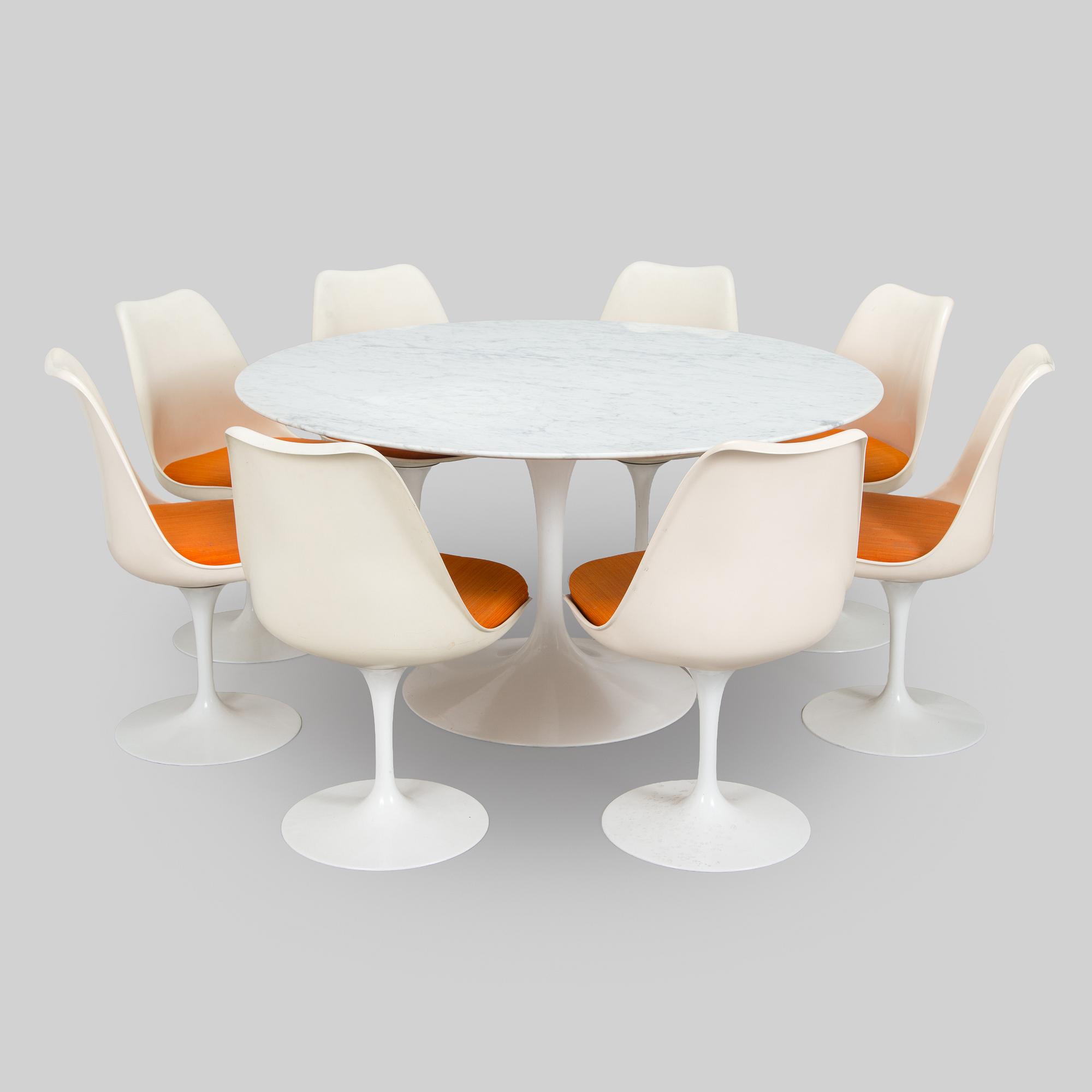 Eero Saarinen, A 'Tulip' furniture set, table with eight chairs, Knoll International, 1970s.