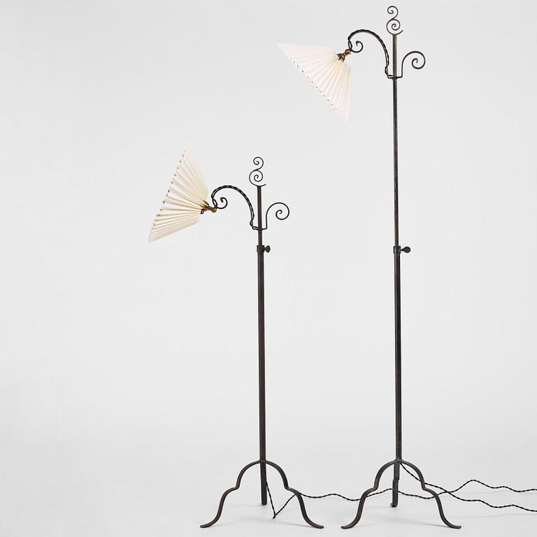 Harald Notini, a pair of wrought iron floor lamps, model "15101", Arvid Böhlmarks Lampfabrik, 1930s.