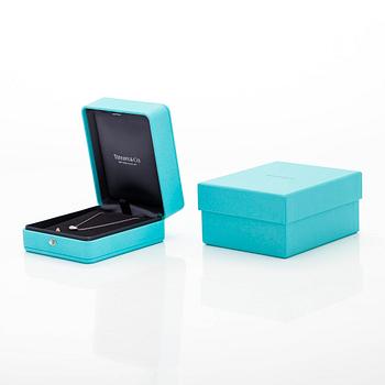 Tiffany & Co, Elsa Peretti, kaulakoru "Bean" platinaa ja timantteja.