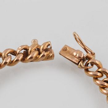ARMBAND, 18K guld med 6 rosenslipade diamanter samt cabochonslipad blå safir, utländsk stämpel. Vikt 8,9 gram.