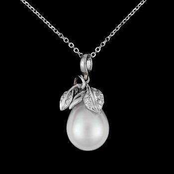 10. A South Sea pearl, circa 14.8 x 12.8 mm, and diamond, ca total 0.08 ct, pendant.