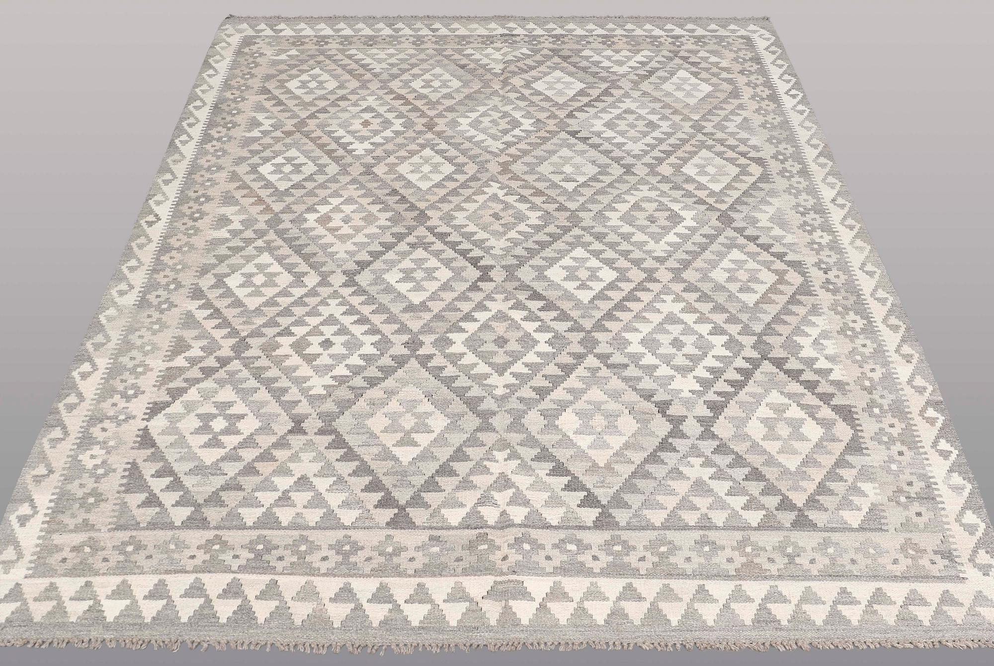 A CARPET, Kilim, ca 242 x 178 cm.