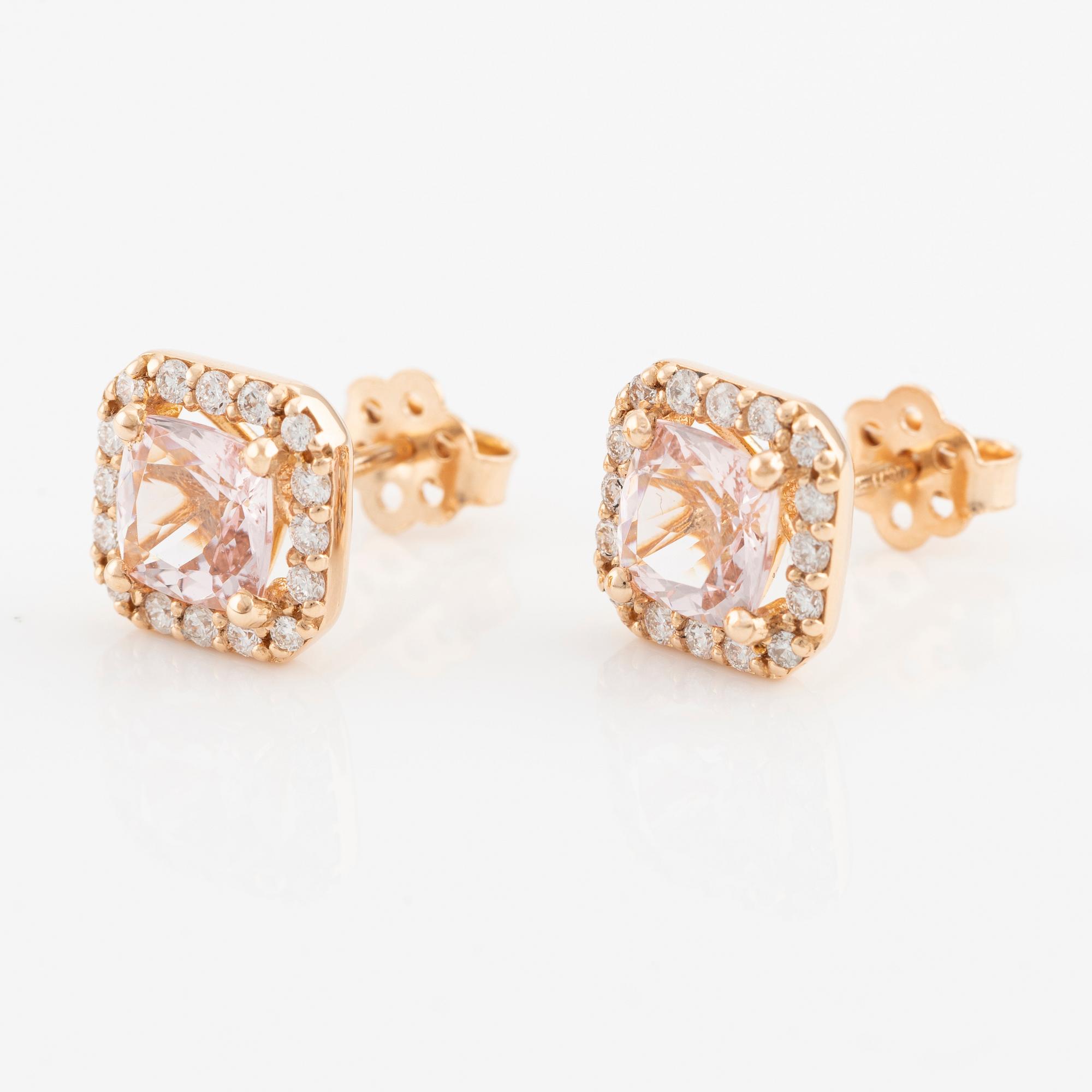 Ett par örhängen 18K guld med fasettslipade morganiter och runda briljantslipade diamanter.