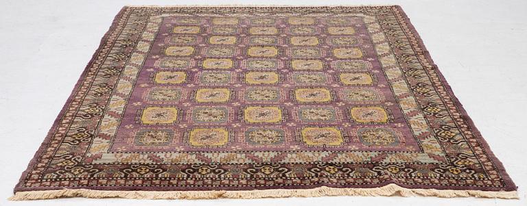 A semi-antique carpet, probably Samarkand, c. 264 x 184 cm.