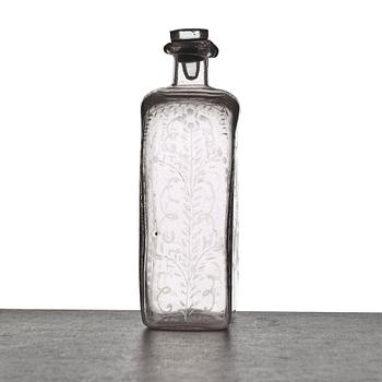 A glass bottle, 18th Century.