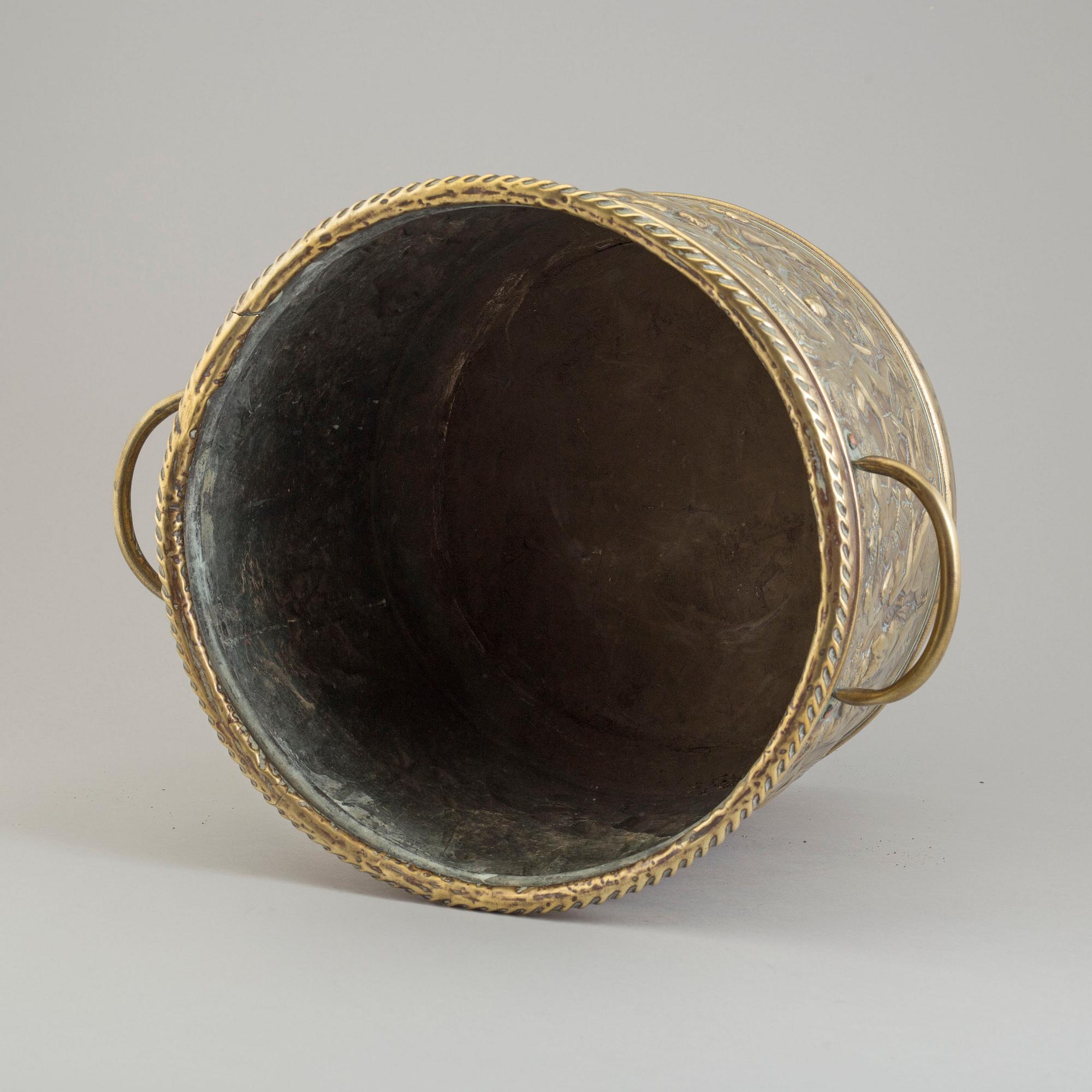 a 18th century brass flower pot.