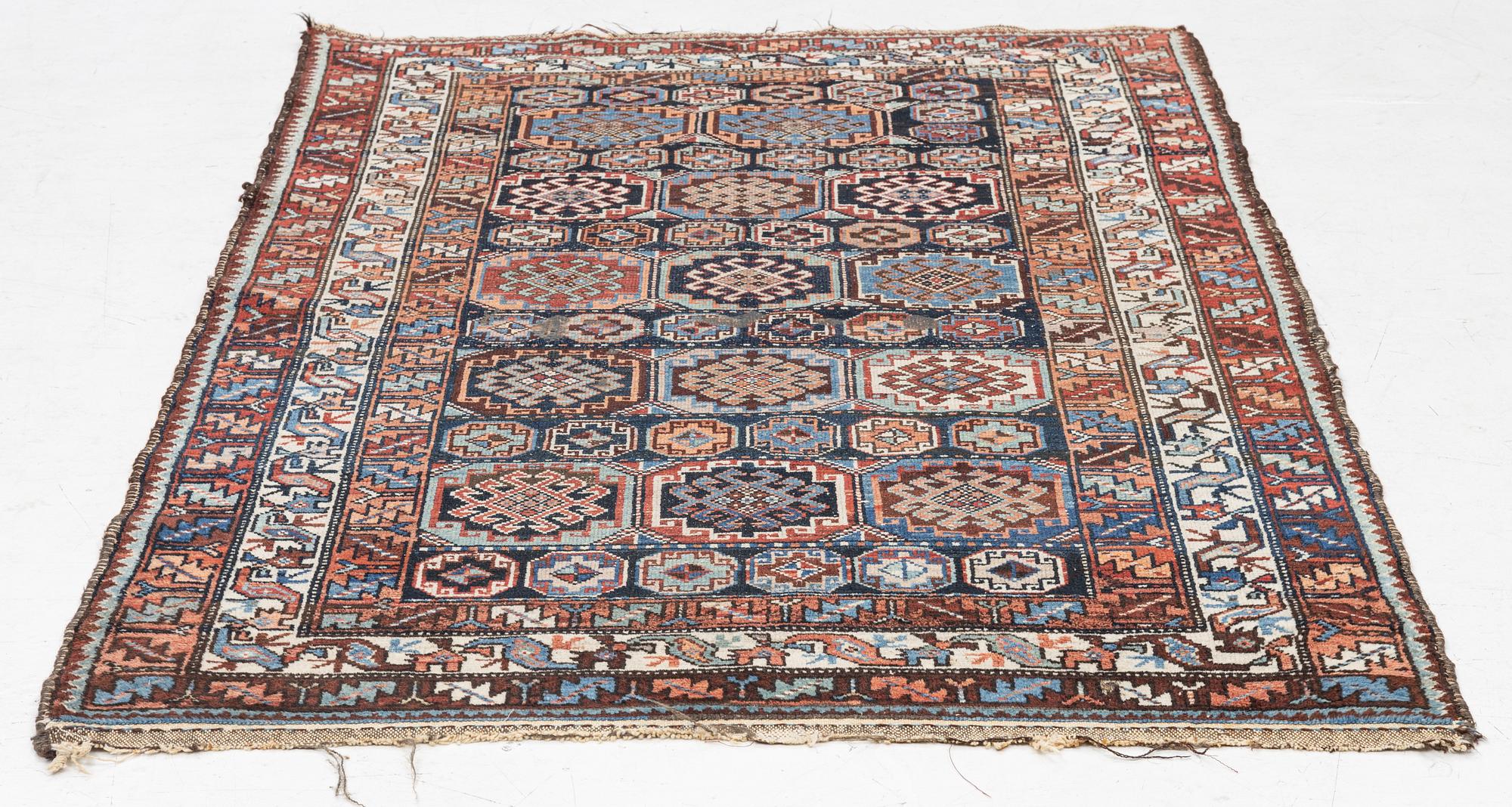 A Northwest Persian antique rug, c. 166 x 106 cm.