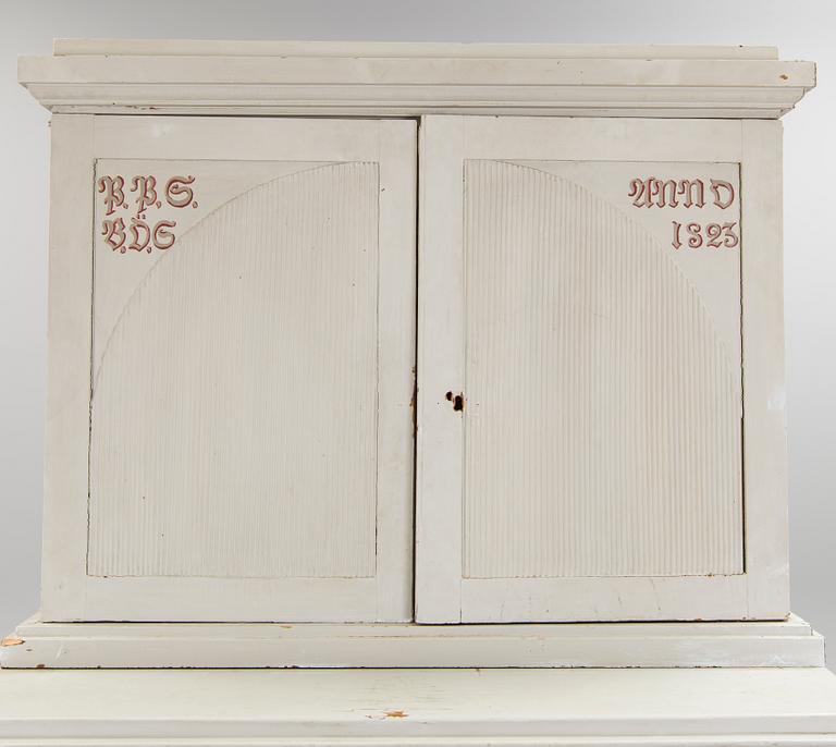 A early 19th century Gustavian cupboard.