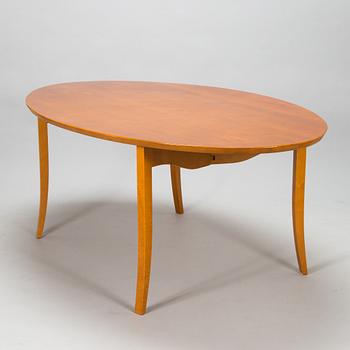 Kimmo Varjoranta, a 9-piece 'Kaiku' dining set retailer  Sope Kaluste. In production 1985-1995.