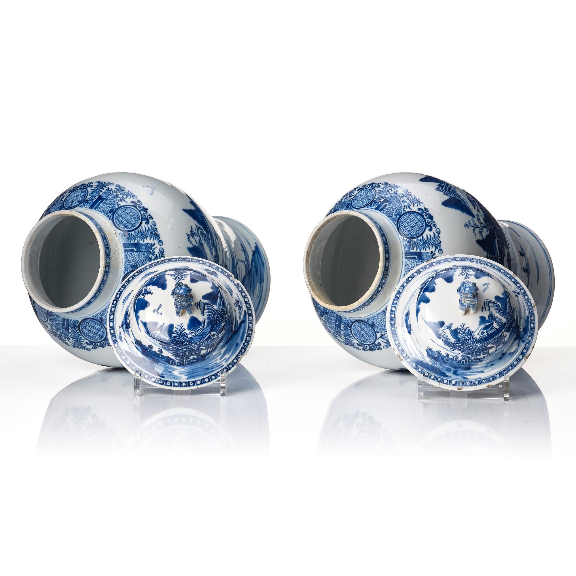 A pair of blue and white Chinese porcelain jars with covers. Qing dynasty, Qianlong (1736-95).