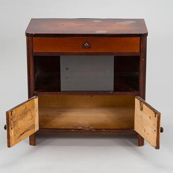 A 1930s functionalist style chest of drawers.