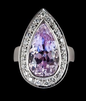 1046. A drop shaped kunzite and diamond ring.