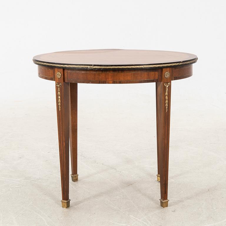 A mid 1900s mahogany Louis XVI style side table.