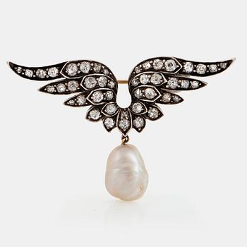 1101. A silver and 14K gold brooch set with old-cut diamonds and a drop shaped pearl.