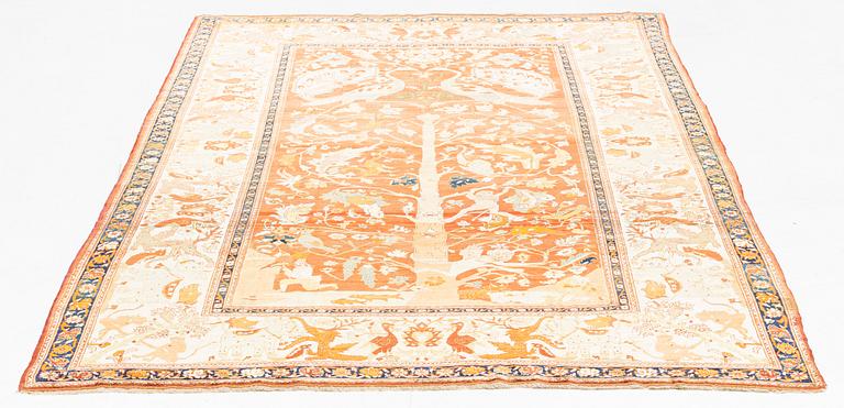 An antique silk Tabriz carpet, north west Persia, c 239 × 168 cm.