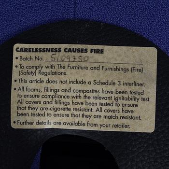 Arne Jacobsen, an armchair with footstool, "The Egg", Fritz Hansen, Denmark, 2003.