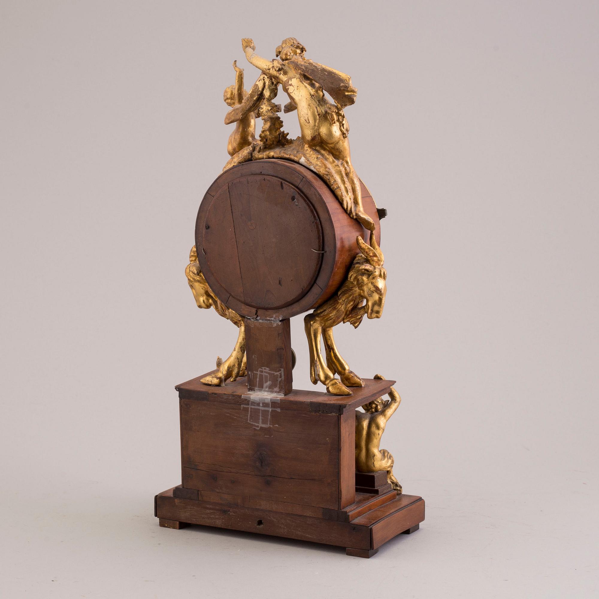 A PENDULUM CLOCK, first half of the 19th century.