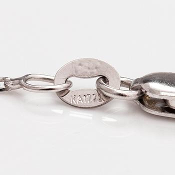 A 14K white gold necklace with a ca. 0.93 ct diamond.