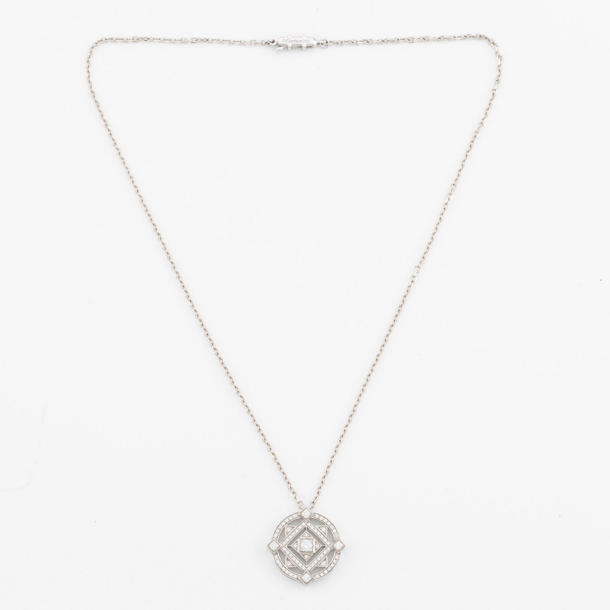 Cartier hängsmycke "Inde Mystérieuse" 18K vitguld med runda briljantslipade diamanter.
