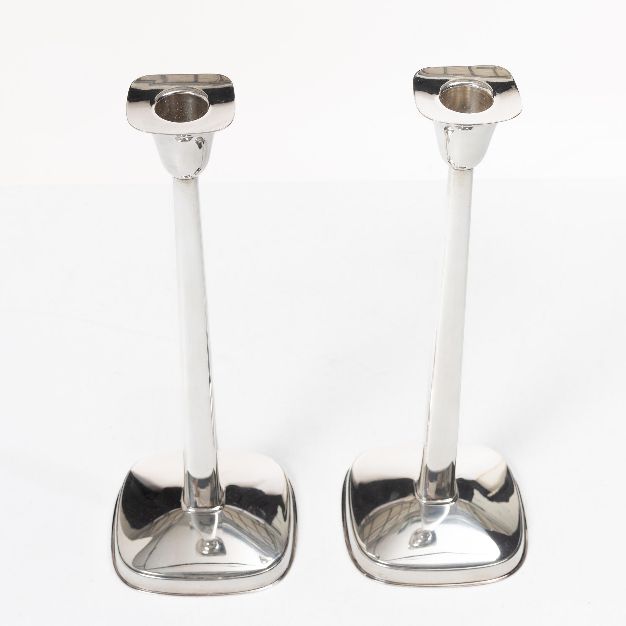 Guldsmedsaktiebolaget (GAB), a pair of silver candlesticks, design Sven-Arne Gillgren, Stockholm 1963.