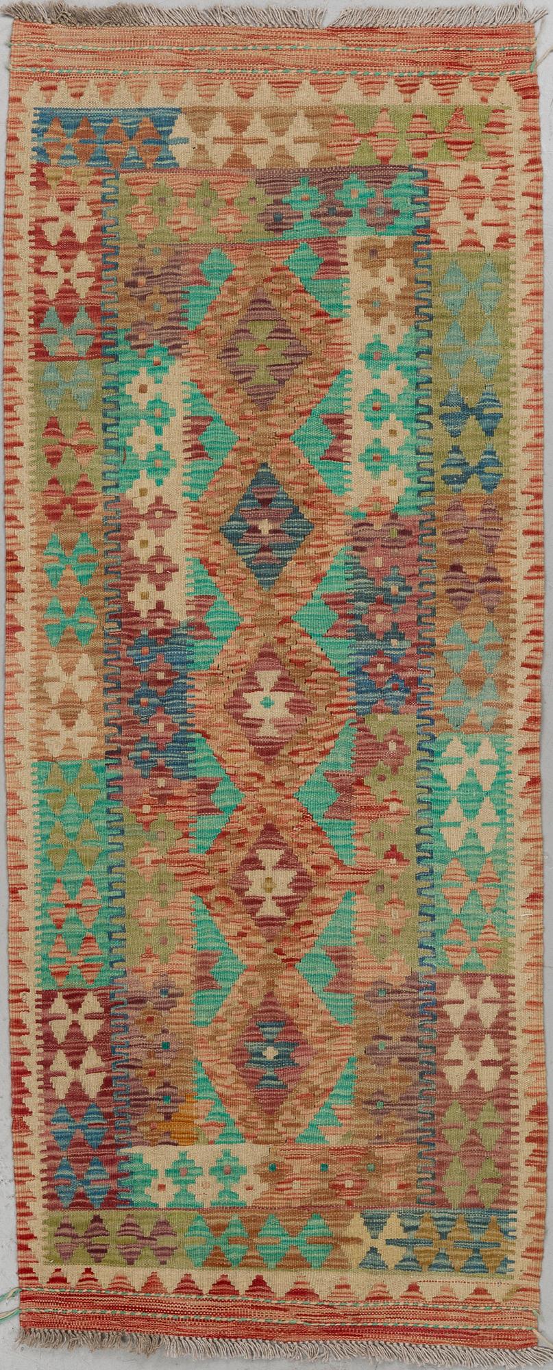 A RUG, kilim 192 x 77 cm.