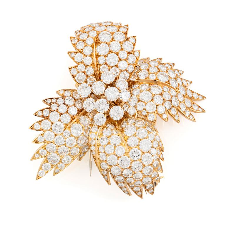 Van Cleef & Arpels brosch 18K guld med runda brilljantslipade diamanter.