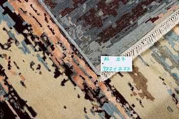 An oriental carpet with modern design, ca. 377 x 277 cm.