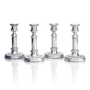 Four English silver candlesticks, marks of John Roberts & Co, Sheffield 1808.