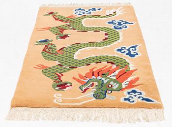 An old Tibet rug, c. 188 x 95 cm.