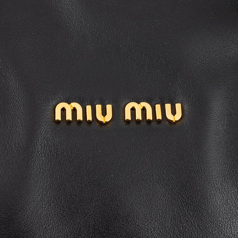 Miu Miu, a black leather handbag.