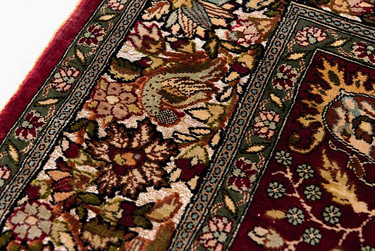 A semi-antique Hereke souf, silk and metal thread rug, West Anatolia, c. 121 x 75 cm.