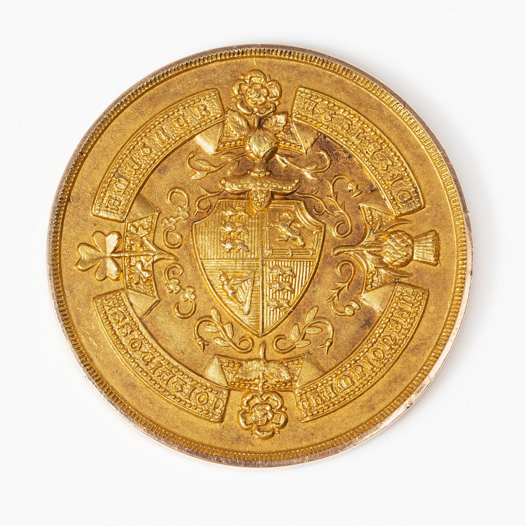 A medal, 15K gold, England, 1913.
