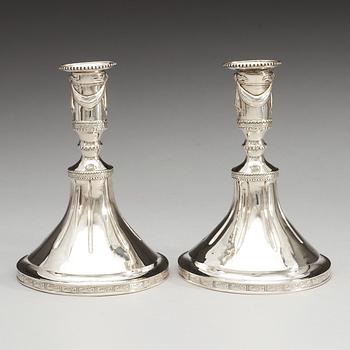 A Swedish pair of 18th century silver candlesticks, makers mark of Johan Bergengren, Kristianstad 1780.