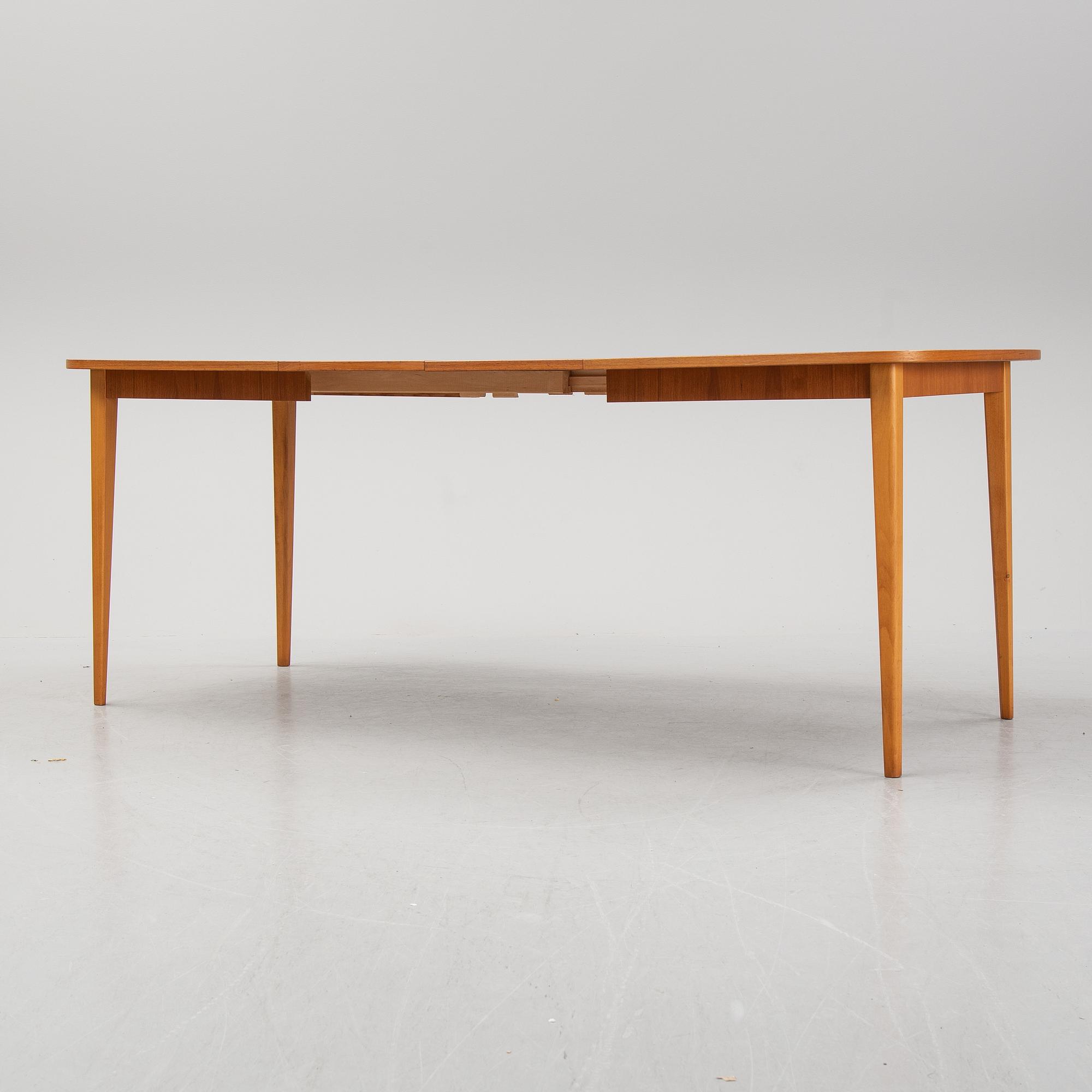a 1950's/60's teak dining table.