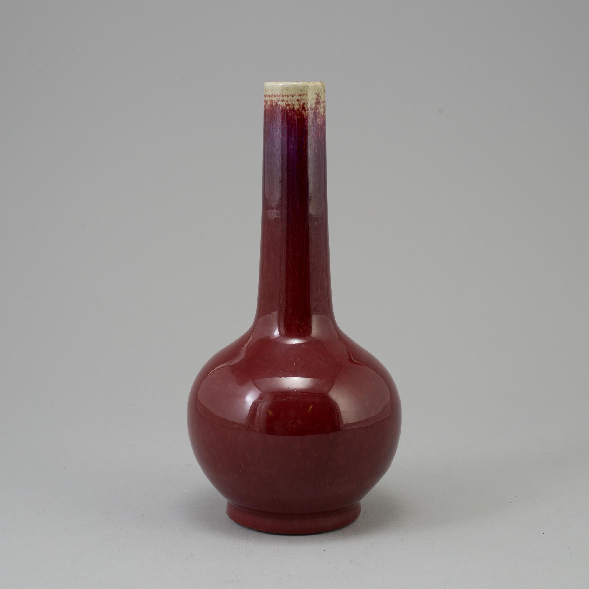 A Chinese copper red glazed bottle vase, presumably late 19th century.