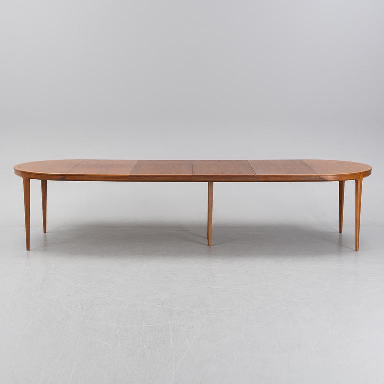 Bertil Fridhagen, a 'Diamant' walnut veneered dining table, with four additional leaves.  Bodafors.