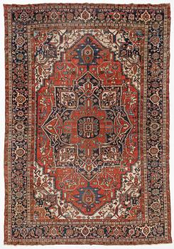 An antique Heris/Karadja carpet, approximately 501 x 339-353 cm.