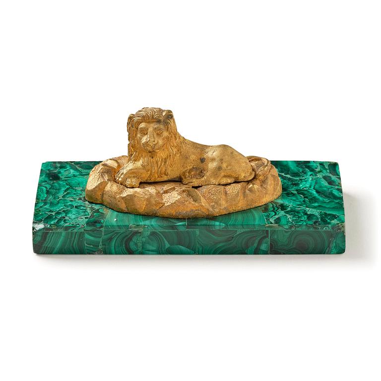 A Russian Nicholas II malachite-veneered and gilt-bronze paperweight, late 19th century.