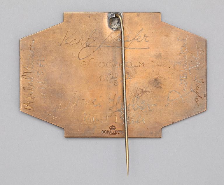 PLAKETT, brons, "Ispalatset Stockholm", CG Hallberg 18/2 1934.