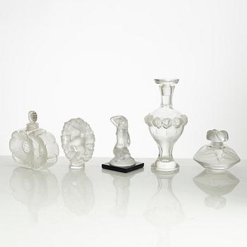 Lalique, four perfume bottles and five figurines, France, after 1945.