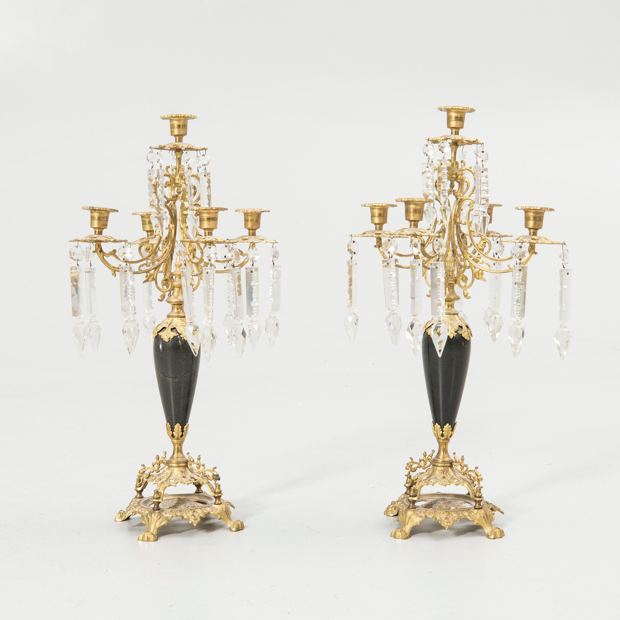 Pair of candelabra and a firedog, 18th/19th century.